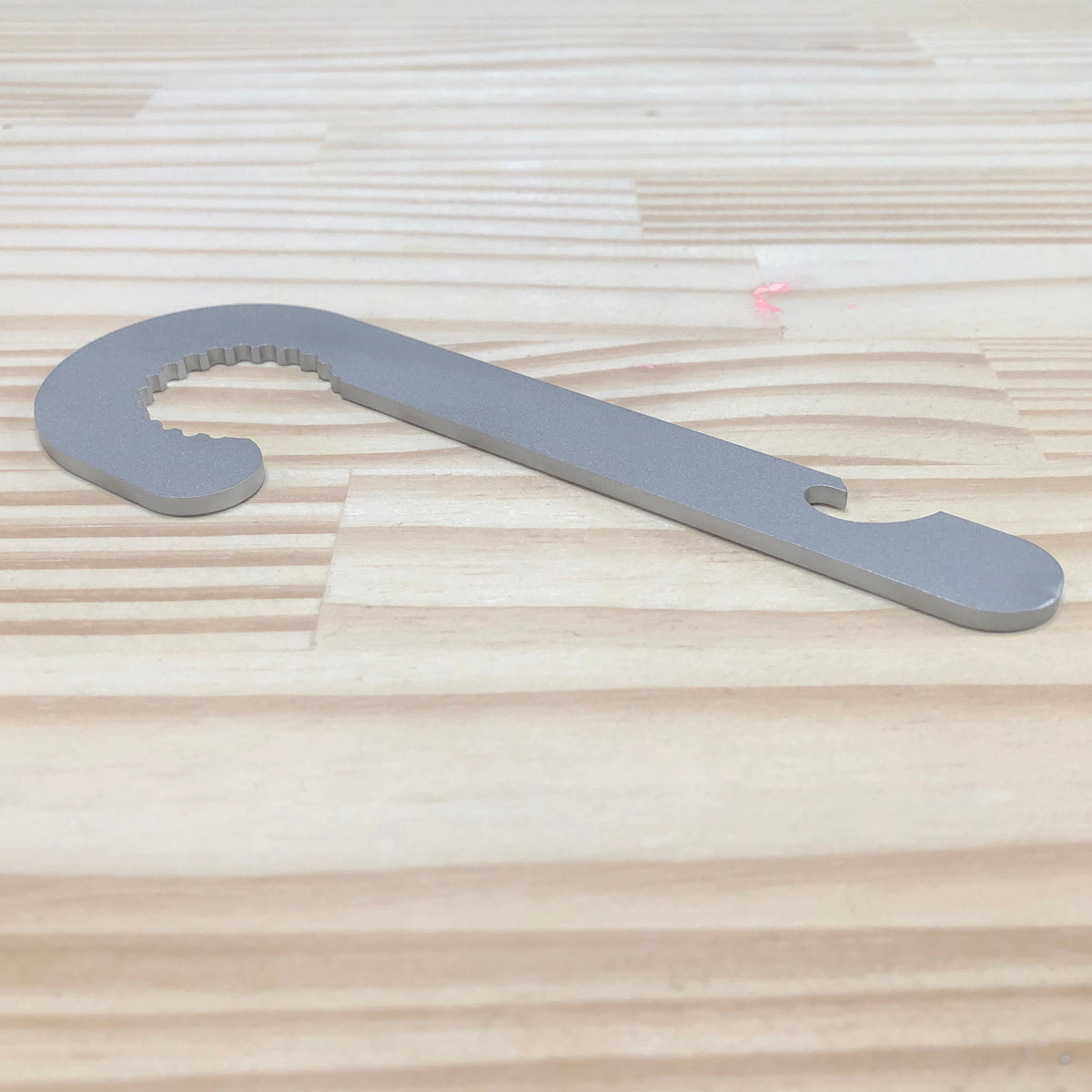 https://www.rawrutes.com/cdn/shop/products/Candy_Cane_Bottle_Opener_Thickness_1200x.jpg?v=1575125969